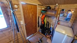an overhead view of the inside of a tiny house at Paradise cottage w sea view in Brännöviken 5, Lögdeå in Lögdeå +19 photos