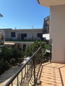 a stairway leading up to a building at San Marco in Velipojë