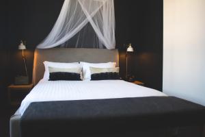 Postel nebo postele na pokoji v ubytování Hotel Palisade