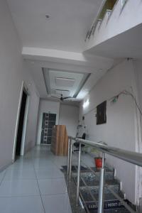 a room with white walls and a ceiling at Hotel Hari Sarovar in Kurukshetra