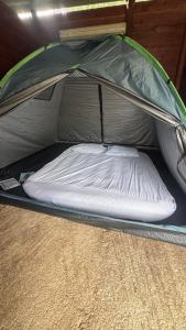 a mattress inside of a camping tent at StNicholas Ranch Corfu Wild Camping in Benitses