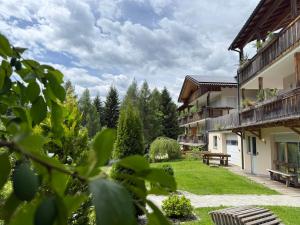 a view of the courtyard of a building at Fuchsmaurer Plose - Apartments bei Brixen in Bressanone