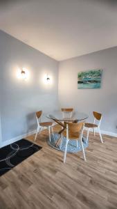 a dining room with a table and two chairs at Crandford in Dublin