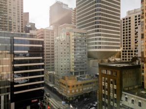 an aerial view of a city with tall buildings at ibis Sydney World Square in Sydney