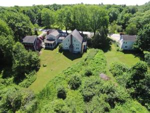 an aerial view of a house with a yard at Hawks House Inn in Walpole