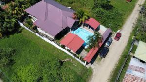 an overhead view of a house with a swimming pool at Casa Playa Cieneguita in Puerto Cortés