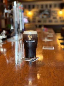 a cup of coffee sitting on top of a bar at Coopers Lane in Dublin +16 photos