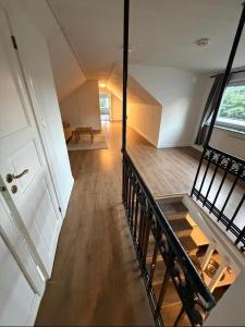 an overhead view of a staircase in a house at Four bedroom house close to the beach in Abbekås