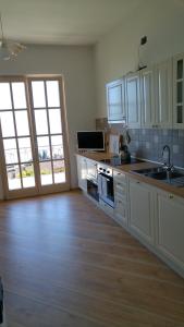 A kitchen or kitchenette at Villa Dina