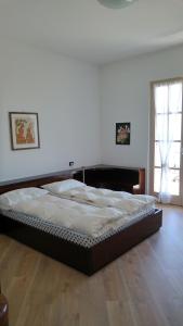 A bed or beds in a room at Villa Dina