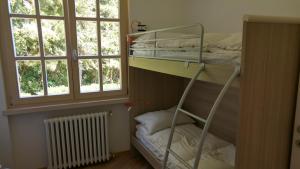 A bed or beds in a room at Villa Dina