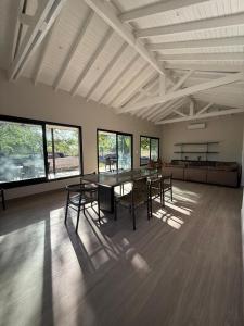 a large room with a table and chairs in it at Casa Las Moras in Santiago del Estero