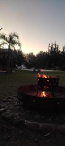 a fire pit in the middle of a park at La Elvira in San Pedro
