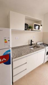 a kitchen with a sink and a counter top at Julieta in La Rioja