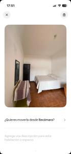 a bedroom with two beds in a room at Habitación 11 Posada Itzel in Oaxaca City