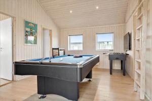 a billiard room with a pool table in it at 30439-Odder-Strandvaenget-74 in Odder