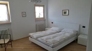 A bed or beds in a room at Villa Dina