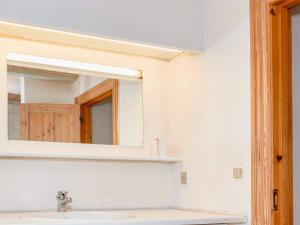 a bathroom with a sink and a mirror at Lush holiday home in Thyholm in Thyholm +26 photos