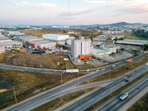 an aerial view of a city with a highway at ibis Contagem Ceasa in Contagem