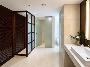 a bathroom with a sink and a toilet at Western Palace Hotel in Incheon +25 photos