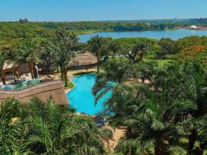 an aerial view of the pool at the resort at Pullman Lubumbashi Grand Karavia. in Lubumbashi