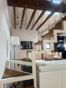 a kitchen with a white counter top in a room at Loft Adrimar in Santoña