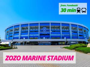 a large blue building with the words zebra marinus stadium at suite Funabashi LAGOON2 #201 in Funabashi