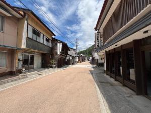 an empty street in a town with buildings at La Terra Hirasawa in Shiojiri +35 photos
