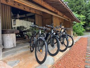 a group of bikes parked outside of a building at La Terra Hirasawa in Shiojiri