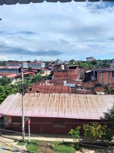 a view of a building with rusty roofs at Hospedaje Luciana in Pucallpa