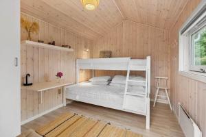 a bedroom with a bunk bed in a house at FY237-Otterup-Vestparken-6 in Otterup