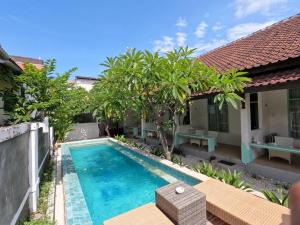 an image of a swimming pool in a villa at Villa PhyPhy 3 in Gili Trawangan +20 photos