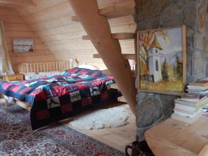 Łóżko lub łóżka w pokoju w obiekcie Chata Stacha