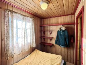 a small room with a bed and a window at 4 person holiday home in gol in Gol