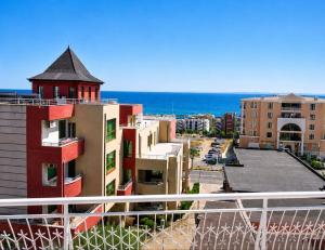 a view from the balcony of a building at Къща за гости Уют in Sveti Vlas