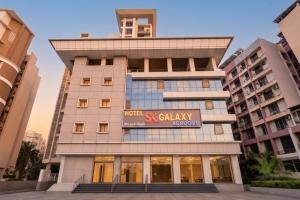 a building with a sign that reads hotel sky gallery at FabHotel SK Galaxy in Thane
