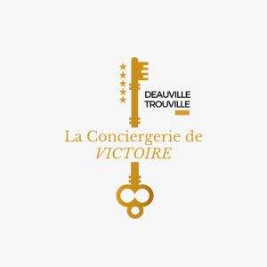 a logo for the dewaltville twp committee at La Chambre Deauvillaise in Deauville
