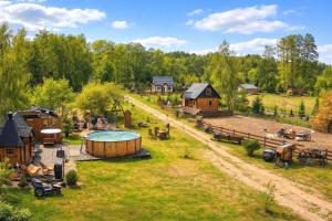 an aerial view of a farm with a hot tub at Campo Gitano in Gaśno +18 photos