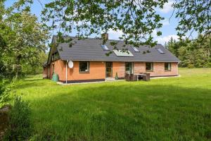 a house with a roof with a large yard at 591-Snedsted-Stenbjergvej-28 in Snedsted