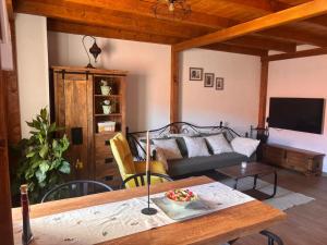 a living room with a couch and a table at Terra Verde in Omiš