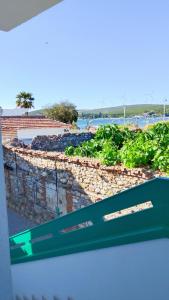 a view from a window of a vegetable garden at Felicitta Stay & Joy in Seferihisar