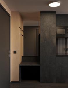 a hallway with a stairway with a stair case at PLAZA Residence Mannheim in Mannheim +4 photos