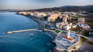 an aerial view of a beach and buildings at Exclusivo apto. Solparaiso-Jacuzzi in Torrox