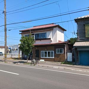 a house on the side of a street at Hakodate Guest House in Hakodate