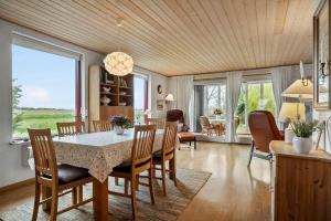 a dining room with a table and chairs at 1039-Stege-Rylevej-30 in Stege
