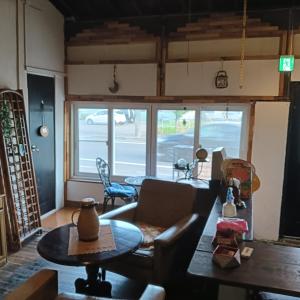 a living room with a couch and a table at Hakodate Guest House in Hakodate +25 photos