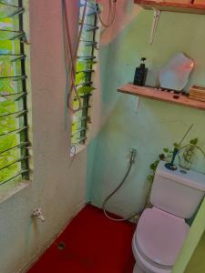 a bathroom with a white toilet in a room at The Artist House in Burgos +38 photos