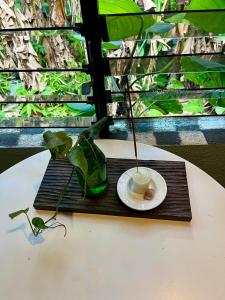a table with a cup of coffee on a wooden tray at The Artist House in Burgos