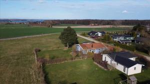 an aerial view of a house in a field at 7000-Bogo-By-Mosedalen-6 in Bogø By