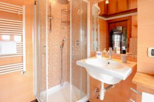 a bathroom with a sink and a shower at Zavaglia House in Lainate
